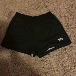 Adidas sweat shorts, front and back pockets, size small.